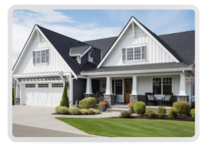 Elegant white house with vertical board & batten siding & custom stone work highlighting the custom home remodeling.