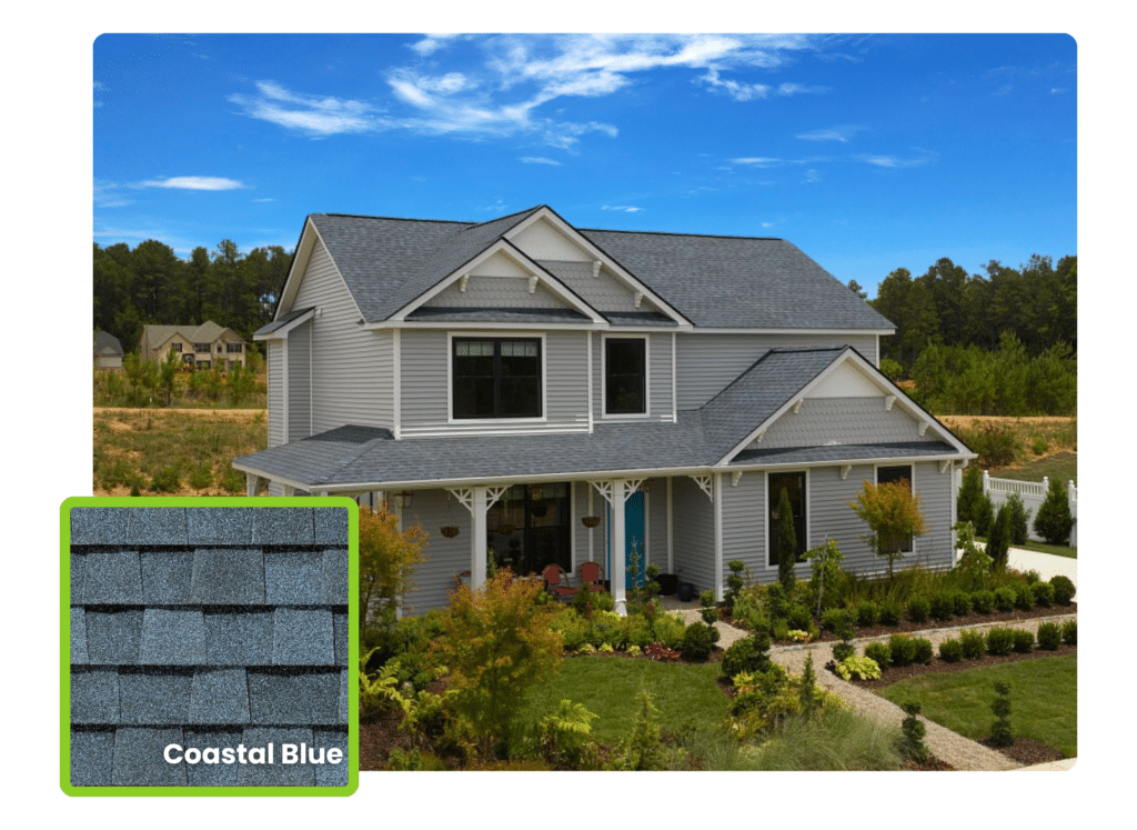 A stately home with a steeply pitched roof covered in premium grey CertainTeed shingles, installed by a certified CertainTeed Shingle Master for long-lasting protection and curb appeal.